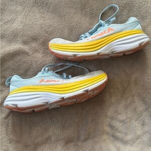 Hoka Athletic Shoes in Light Blue and Yellow